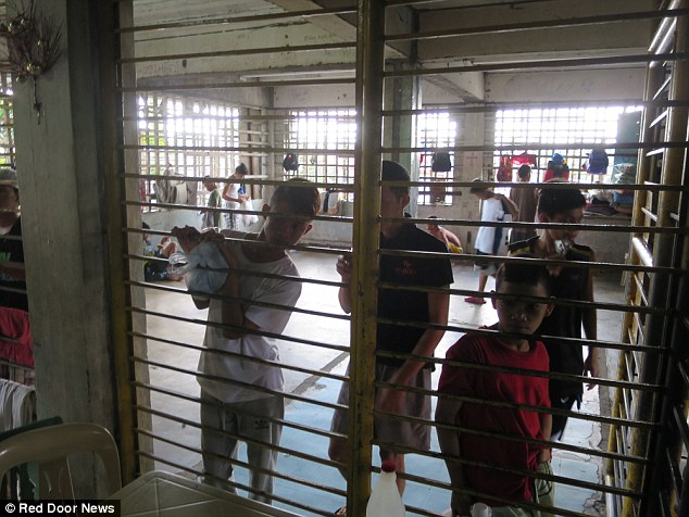 0578-2906730-PIX_for_Mail_Online_Exclusive_Street_Children_in_Manila_jailed_a-a-10_1421135531440.jpg