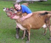 Katie_Hugging_Cow.jpg