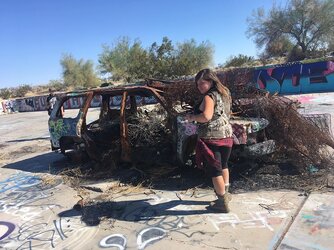 Maci and the burned out car jambo 2018.jpg