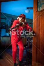 stock-photo-19490935-backwoods-man-in-doorway-with-shotgun-apprehensive-long-underwear-2.jpg